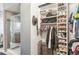 Well-organized closet with hanging space and shelving at 5731 Boston Ct, Denver, CO 80238