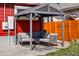 Inviting backyard patio featuring a stylish outdoor seating area under a modern gazebo at 4452 Zenobia St, Denver, CO 80212