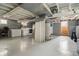 Spacious basement with laundry area including washer, dryer, and utility connections at 4452 Zenobia St, Denver, CO 80212