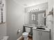 Tastefully designed powder room featuring modern fixtures, granite counters, and stylish decor at 13972 Hudson Way, Thornton, CO 80602