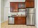 Modern kitchen showcasing stainless steel appliances, granite countertops, and ample cabinet space at 315 E Bayaud Ave, Denver, CO 80209