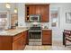 Kitchen with granite countertops, stainless steel appliances, and ample storage space at 315 E Bayaud Ave, Denver, CO 80209