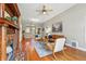 Cozy living room with a decorative fireplace, hardwood floors, and comfortable seating area at 315 E Bayaud Ave, Denver, CO 80209