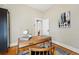 Bright home office featuring a stylish desk, globe, and modern artwork at 315 E Bayaud Ave, Denver, CO 80209