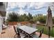 Wooden deck, great for relaxing or entertaining, surrounded by a well-maintained yard at 18997 E Crestridge Cir, Aurora, CO 80015