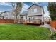 This home features a spacious backyard with a patio, perfect for outdoor entertaining at 18997 E Crestridge Cir, Aurora, CO 80015