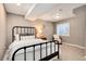 Finished basement bedroom with window and comfortable seating at 18997 E Crestridge Cir, Aurora, CO 80015