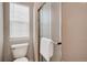 Modern bathroom featuring glass enclosed shower and window for natural light at 18997 E Crestridge Cir, Aurora, CO 80015
