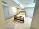 Carpeted bedroom with a stylish metal bed frame and a neutral color palette at 18997 E Crestridge Cir, Aurora, CO 80015