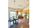 Bright kitchen with stainless steel appliances, light wood cabinets, and modern lighting at 18997 E Crestridge Cir, Aurora, CO 80015