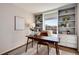 Home office with built-in shelves and window seat at 18997 E Crestridge Cir, Aurora, CO 80015