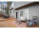 This home features a comfortable patio with lounge seating and outdoor dining at 18997 E Crestridge Cir, Aurora, CO 80015