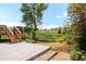 Spacious backyard featuring a patio and a staircase leading to a deck with a view at 4547 Tally Ho Trl, Boulder, CO 80301