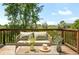 Outdoor deck with comfortable seating showcasing a beautiful view of the surrounding nature at 4547 Tally Ho Trl, Boulder, CO 80301