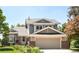 Charming two-story home with a well-manicured lawn and a two-car garage at 4547 Tally Ho Trl, Boulder, CO 80301