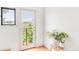 Bright room with a scenic view from the balcony and a decorative vase at 4547 Tally Ho Trl, Boulder, CO 80301