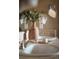 Close up of the bathroom vanity with decor and and sinks at 900 Wilshire Dr, Berthoud, CO 80513