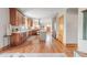 Expansive kitchen with hardwood floors, stainless steel appliances, and an open layout at 900 Wilshire Dr, Berthoud, CO 80513
