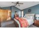 Comfortable main bedroom featuring vaulted ceiling and a king bed with white linens at 900 Wilshire Dr, Berthoud, CO 80513