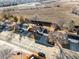 An aerial view of a home's roof and driveway on a clear, sunny day at 11423 Steele St, Thornton, CO 80233