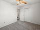 Bedroom featuring neutral carpet, a ceiling fan, and closet with doors at 11423 Steele St, Thornton, CO 80233