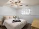 Relaxing bedroom featuring neutral carpet, a ceiling fan, and a comfortable bed at 11423 Steele St, Thornton, CO 80233