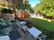 Large backyard with patio, grass, and shed at 3515 Pierce St, Wheat Ridge, CO 80033