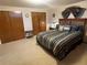 Basement bedroom with a queen-size bed and closet at 3515 Pierce St, Wheat Ridge, CO 80033