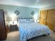 Spacious bedroom with king-size bed and nightstands at 3515 Pierce St, Wheat Ridge, CO 80033