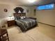 Basement bedroom with a queen-size bed at 3515 Pierce St, Wheat Ridge, CO 80033