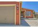 Front exterior with gravel yard, painted walls, and visible house number at 253 Cherokee Pl, Brighton, CO 80603