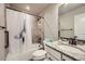 Well-lit bathroom featuring a shower-tub combination, granite counters, and a white vanity with drawers at 1798 Summerglow Ln, Monument, CO 80132