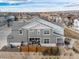 Aerial view of the home featuring the back deck and solar panels on the roof at 11450 Booth Falls Ct, Parker, CO 80134