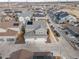 An aerial view shows off the neighborhood with sidewalks and green spaces at 11450 Booth Falls Ct, Parker, CO 80134