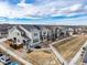 Street view of well maintained homes with solar panels in a well planned community at 11450 Booth Falls Ct, Parker, CO 80134