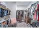 Spacious walk-in closet with ample shelving and hanging space for clothes and accessories at 11450 Booth Falls Ct, Parker, CO 80134