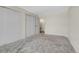 Neutral bedroom featuring a carpeted floor and large closets at 7801 W 35Th Ave # 409, Wheat Ridge, CO 80033