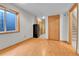 Finished basement offers laminate flooring, access to the stairwell and extra storage space at 5885 Kingsfield St, Castle Rock, CO 80104