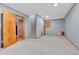Open basement area features new carpeting and a full staircase for easy access at 5885 Kingsfield St, Castle Rock, CO 80104