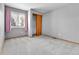 Bedroom with carpeting, neutral walls, window, closet, and natural light at 5885 Kingsfield St, Castle Rock, CO 80104