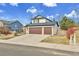 Lovely two-story home with a three-car garage on a spacious corner lot at 5885 Kingsfield St, Castle Rock, CO 80104