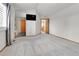 Large main bedroom with ensuite bathroom, walk-in closet and mounted TV at 5885 Kingsfield St, Castle Rock, CO 80104