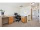 Bright office space with custom desk and storage options, perfect for working from home at 12728 Jasmine St # E, Thornton, CO 80602