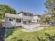 Exterior of the house features a white wooden deck and a well-maintained lawn at 17014 Carr Ave, Parker, CO 80134