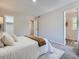 Inviting bedroom with a plush bed, soft textures, and ample natural light at 17014 Carr Ave, Parker, CO 80134