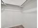 Walk-in closet with carpet and shelving at 17014 Carr Ave, Parker, CO 80134