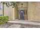 Close-up of the front entrance featuring a secure door and building number for easy identification at 7455 E Quincy Ave # 103, Denver, CO 80237