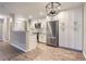 Spacious kitchen with a breakfast bar, stainless steel appliances, and abundant cabinet storage at 7455 E Quincy Ave # 103, Denver, CO 80237