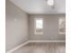 Bright bedroom with plenty of natural light shining through the windows at 2004 S Galapago St, Denver, CO 80223