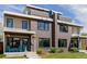 Stunning exterior featuring a brick facade, modern windows, and well-maintained landscaping creating a welcoming entrance at 2004 S Galapago St, Denver, CO 80223